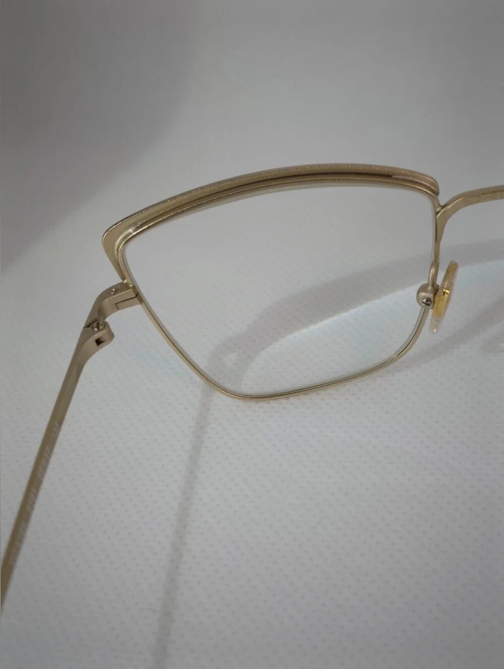 Vogue. Stylish Cat-Eye Metal Frame Glasses in Rose Gold Silk Texture.